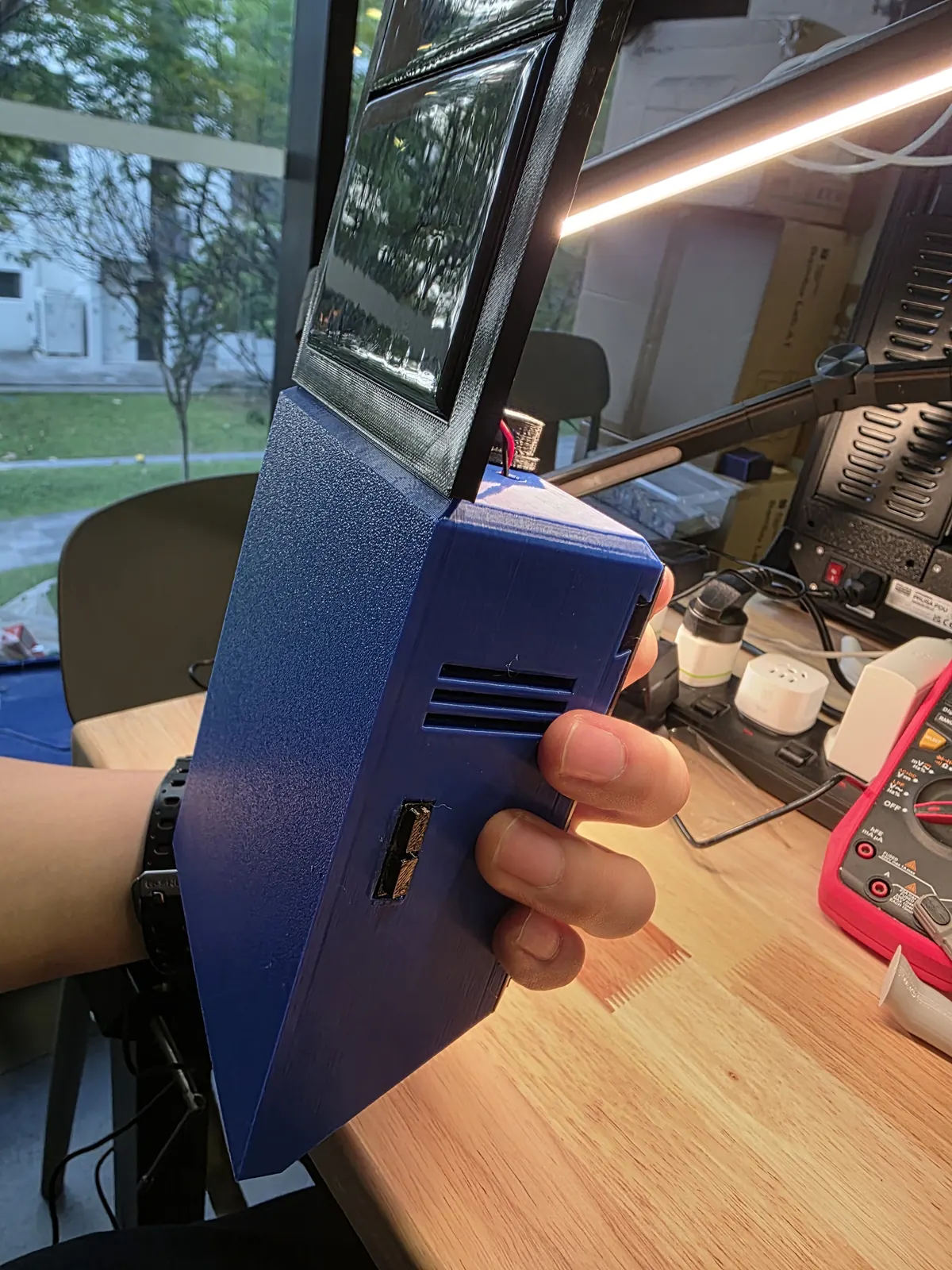 Side of the enclosure showing the ventilation slots added in the second design